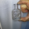 Strange small bottle.