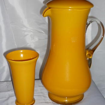 Happy looking jug and beaker
