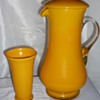 Happy looking jug and beaker