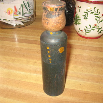 Wooden policeman crayon holder?