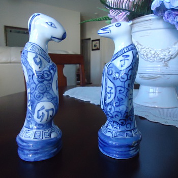 TWO BLUE AND WHITE  PORCELIN FIGURINES