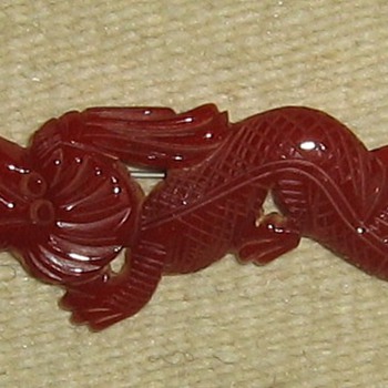 dragon bakelite brooch
