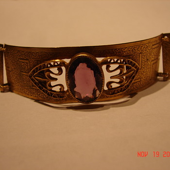 Gold Bracelet With Swastika And Large Rhinestone - Gold