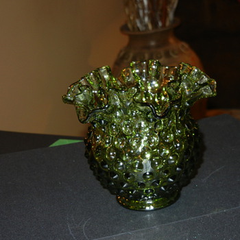 Green  ruffled glass vase?