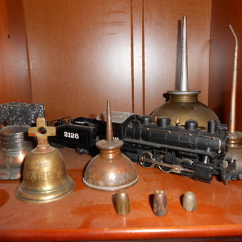 Bells,oil cans, roof bullets ,and train