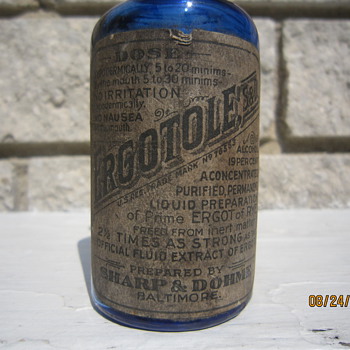 1908-1912 ABM Ergotole Sharp & Dohme Baltimore Cobalt Blue Medicine Bottle w/ Label