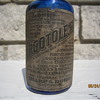 1908-1912 ABM Ergotole Sharp & Dohme Baltimore Cobalt Blue Medicine Bottle w/ Label