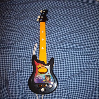 Michael Jackson toy guitar