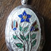 Enameled flower Sterling Silver beautiful carved locket
