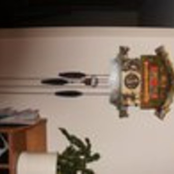 "Eloper" german cookoo clock, works. I believe its also known as "farmers daughter"