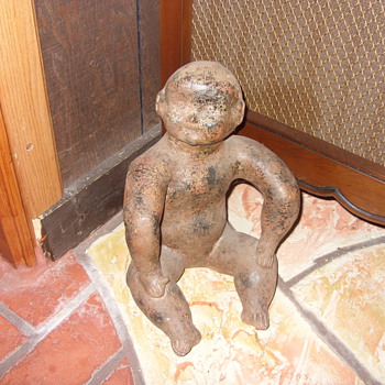 some kind of creepy doll - Art Pottery