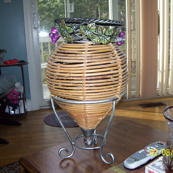 pewter round thing with bamboo