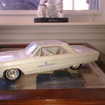 '66 Plymouth Driver's Ed Fury & my Motorific cars...  The motorifics were battery powered..