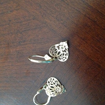 ? If anyone know about 14kt T and C Heart Earrings.  What is it? - Fine Jewelry