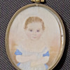 Young Girl Photo in oval frame 2 1/2" by 2"