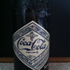 The Atlanta GA, Coca-Cola 75th Anniversary Bottle (10 FL. Oz).