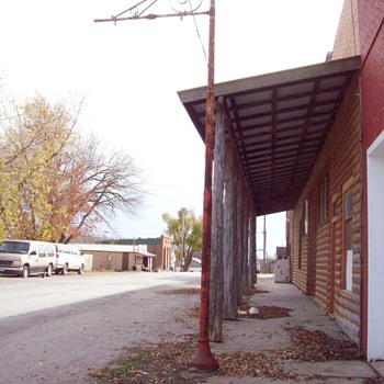 An old Socony Vacuum gas station sign post