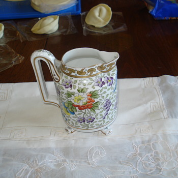 A rare Oscar and Edgar Gutherz milk jug - Pottery
