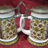 two german beer drinking mugs
