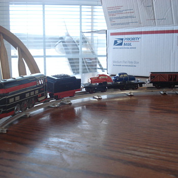 antique tin battery powered train