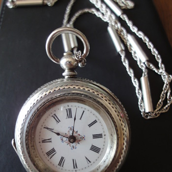 Victorian silver pocket watch and sterling silver chain