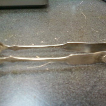 Old sugar cube utensil from Finland with Emil signature