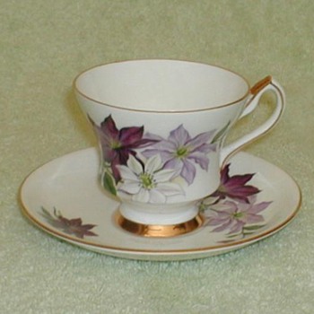 "Society" Tri-color Poinsettia bone china