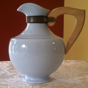 Pitcher with brass and wooden handle