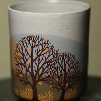 a simple, unmarked cup with a beautiful image and colors. - Pottery
