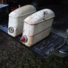 A set of early steel saddlebags