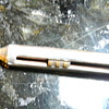ITS THE INSIDE OF AN ANTIQUE MECHANICAL PENCIL