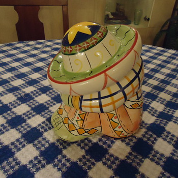 A SMALL MEXICAN COOKIE JAR.