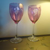 A PAIR OF WINE COLORED WINE GLASSES