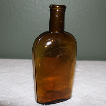 Pre Prohibition Handblowen 1/2 pint Strap Sided Cork Top Bottle - Bottles