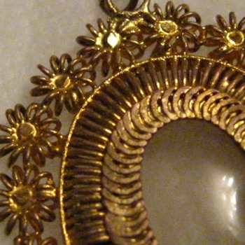 Filgree wire work 2 sided locket with a miniature baby rattle inside? - Fine Jewelry