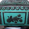 Folk or primitive box with paper cut outs