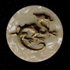 plastic 1 3/4" button with high relief brass dragon 
