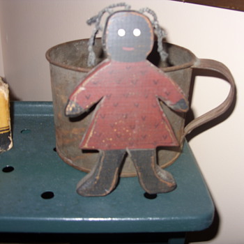 black folk art wood doll