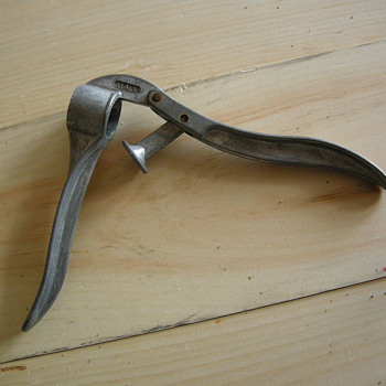 A Simplex garlic press made in Italy - Kitchen