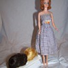 Barbie with 3 wigs and wig stand any idea what it is worth?