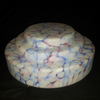 Beautiful white hanging shade marbled with soft purple and blue.