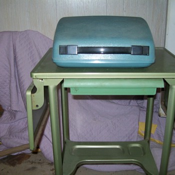 Old typewriter and stand