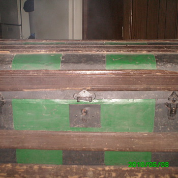 vintage humpbak trunk with metal inlays