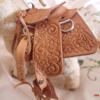 Steiff? mountain goat with tooled leather saddle