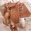 Steiff? mountain goat with tooled leather saddle