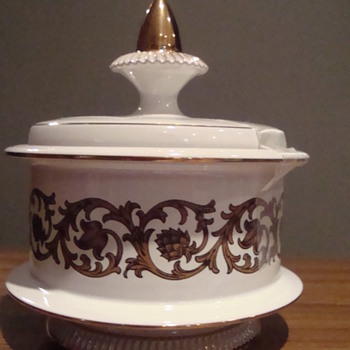 A Covered  Jar , maybe a Candy bowl??