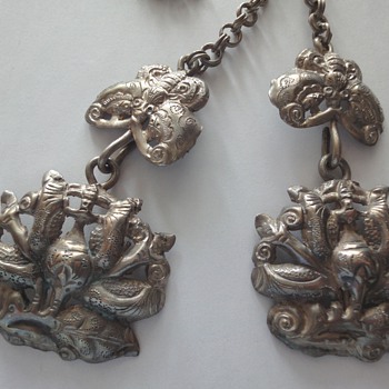 Who can tell me more about this antique Chinese silver jewelry?