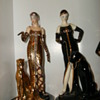 two ladies, one house of erte franklin mint ocelot and one flapper lady with panther