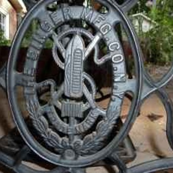 antique singer sewing machine table with glass top dated 1884