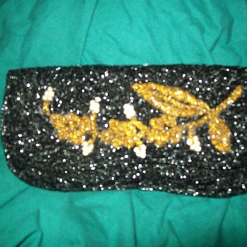 Purses, clutch and hand bag